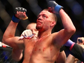 Nate Diaz celebrates his victory over Conor McGregor during UFC 196 at the MGM Grand Garden Arena in Las Vegas March 5, 2016. (Mark J. Rebilas/USA TODAY Sports)