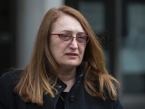 Sahar Bahadi, Sammy Yatim's mother, leaves 361 University Ave. courthouse after sentencing hearing for Const. James Forcillo on Wednesday, May 18, 2016. (Craig Robertson/Toronto Sun)