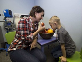 Andrea Ballas and son William took part in a study that suggests that infants whose mothers eat more fruit during pregnancy do better developmentally. Photo taken May 25, 2016 in Edmonton. (Greg Southam photo)