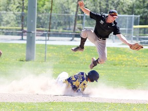 Parker Savard of the Bishop Alexander Carter Gators steals second as shortstop Bradley Chenier of Ecole secondaire catholique l'Horizon gets some air while making a catch during boys NOSSA action in Sudbury, Ont. on Wednesday May 25, 2016. Gino Donato/Sudbury Star/Postmedia Network