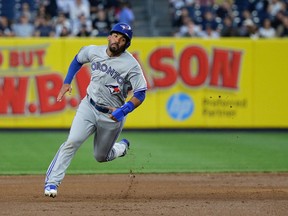 Toronto Blue Jays' Devon Travis runs toward third on the way to scoring on a double by Ryan Goins against the New York Yankees during the fourth inning of a baseball game May 25, 2016, in New York. (JULIE JACOBSON/AP)