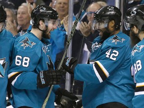 San Jose Sharks forward Joel Ward (42) celebrates his goal with teammate Melker Karlsson (68) during Game 6 of the Western Conference final against the St. Louis Blues Wednesday, May 25, 2016, in San Jose, Calif. (AP Photo/Marcio Jose Sanchez)