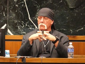 Terry Bollea, known as professional wrestler Hulk Hogan, listens while testifying in his case against the news website Gawker at the Pinellas County Courthouse, in St. Petersburg, Fla., Monday, March 7, 2016. (Boyzell Hosey/Tampa Bay Times via AP, Pool)