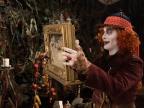 This image released by Disney shows Johnny Depp in a scene from "Alice Through the Looking Glass," premiering in US theaters on May 27. (Peter Mountain/Disney via AP)