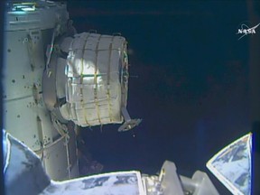 In this frame from NASA TV, a new experimental room at the International Space Station partially inflates Thursday, May 26, 2016. NASA released some air into the experimental inflatable room, but put everything on hold when problems cropped up. (NASA TV via AP)