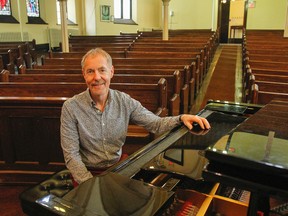 Mark Sirett, founding artistic director of the Cantabile Choirs of Kingston, at Sydenham Street United Church on Thursday. The choir program is celebrating its 20th anniversary with a concert Saturday evening.
(Julia McKay/The Whig-Standard)