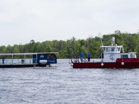 The Queen Elizabeth, a 100% electric vessel to be operated by Rideau Canal Cruises this spring and summer, is towed in the water of the Gatineau River for the first time for testing. Errol McGihon/Postmedia