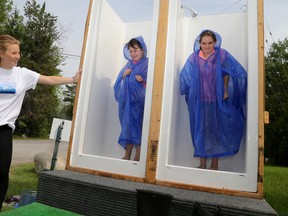 Emily Mountney-Lessard photos/The Intelligencer
Students from Campbellford's Kent Public School learn about the difference between water efficient shower heads and traditional shower heads during the Quinte Children's Water Festival at Batawa Ski Hill on Thursday.