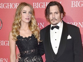 Johnny Depp and Amber Heard. (AP file photo)