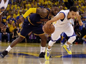 Cleveland Cavaliers forward LeBron James and Golden State Warriors guard Stephen Curry. (AP Photo/Ben Margot, File)