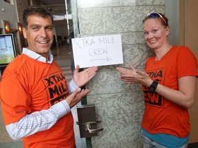 Domenic Caminiti. left, and Lara Winnemore are co-leading the Extra Mile Crew. (Jean Levac, Postmedia)