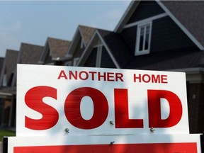 Industry analysts credit consumer confidence with increased resale and new home purchases in April. SEAN KILPATRICK / THE CANADIAN PRESS