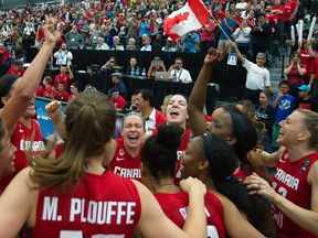 The Canadian women's team celebrates their gold medal win last summer at the FIBA Americas championship at the Saville Community Sports Centre in Edmonton. (File)