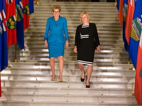 Alberta Premier Rachel Notley, right, and Ontario Premier Katheen Wynne are seen at the Alberta Legislature on Thursday. (GREG SOUTHAM)