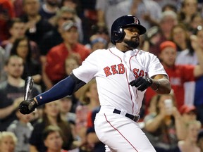 Jackie Bradley Jr. of the Boston Red Sox grounds out against the Colorado Rockies during the eighth inning of a baseball game at Fenway Park on May 26, 2016. Bradley went 0-for-4, ending his hitting streak at 29 games. (ELISE AMENDOLA/AP)