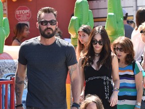 Megan Fox and Brian Austin Green take their sons to the Farmers Market, April 17, 2016. (WENN.COM)