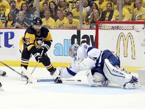 Tampa Bay Lightning goalie Andrei Vasilevskiy (88) makes a save against Pittsburgh Penguins right wing Phil Kessel (81) during the third period in game seven of the Eastern Conference Final of the 2016 Stanley Cup Playoffs at the CONSOL Energy Center May 26, 2016. The Penguins won the game 2-1 and the Eastern Conference Championship four games to three. (Charles LeClaire-USA TODAY Sports)