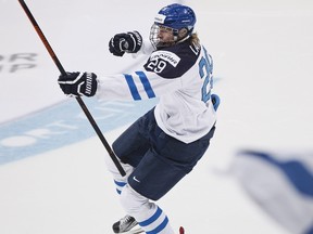 Patrik Laine of Finland celebrates scoring against Russia during the 2016 IIHF World Junior Ice Hockey Championship final match between Finland and Russia in Helsinki, Finland on Jan. 5, 2016. (Roni Rekomaa/Lehtikuva via AP)