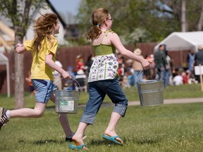 Two girls take part in the Peoples of the North festival in Fort Saskatchewan, one of many activities regularly held in the community.