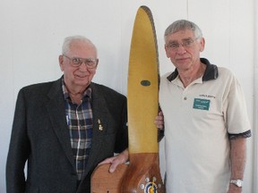 Eugene McGee (left) presented Fred Bruinsma with a 1943 tiger moth propeller to be hung on the wall of the clubhouse. (Laura Broadley/Goderich Signal Star)