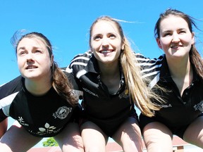 The Sarnia Saints senior women's rugby team, including from left Erin Esplen, Bianca Sfalcin and Cassie Kerrigan, will open a new season Saturday at Norm Perry Park. The Saints host Hamilton at 12 p.m. (Terry Bridge/Sarnia Observer/Postmedia Network)