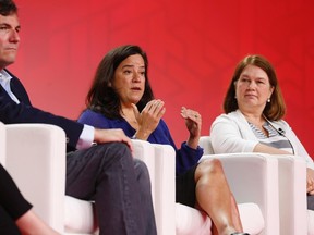 MPs, from left, Dominic LeBlanc, Jody Wilson-Raybould and Jane Philpott speak onstage at the 2016 Liberal Biennial Convention in Winnipeg, Friday, May 27, 2016. THE CANADIAN PRESS/John Woods