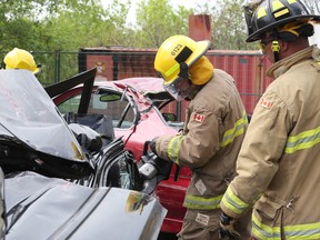 Students took part in first responder rescue techniques, including extrication seminar with Ottawa Firefighters. Jean Levac/Postmedia