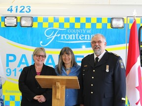 Natalie Nossal, Frontenac Islands county councillor (left), Sophie Kiwala, MPP for Kingston and the Islands and Paul Charbonneau, Frontenac Paramedics Chief (right), were on hand on May 27 to announce extended funding for the county's paramedicine program.