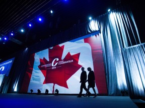 Former prime minister Stephen Harper, left, and his wife Laureen Harper walk on stage for his address to delegates during the 2016 Conservative Party Convention, in Vancouver, B.C. on Thursday, May 26, 2016. THE CANADIAN PRESS/Darryl Dyck