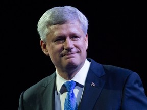 Former prime minister Stephen Harper leaves the stage after addressing delegates during the 2016 Conservative Party Convention in Vancouver, B.C. on Thursday, May 26, 2016. THE CANADIAN PRESS/Darryl Dyck