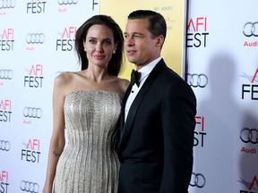 Writer-director-producer-actress Angelina Jolie Pitt (L) and actor-producer Brad Pitt attend Audi at the opening night gala premiere of 'By the Sea' during AFI FEST 2015 at TCL Chinese 6 Theatres on November 5, 2015 in Hollywood, California. (Jonathan Leibson/Getty Images for Audi)