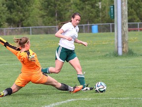 College Notre-Dame goalkeeper Josee Scott looks to stop Madison Laberge of Confederation Secondary School during girls AA NOSSA soccer final action at the Howard Armstrong Recreation Centre soccer fields in Hanmer, Ont. on Friday May 27, 2016. Laberge score on the play. John Lappa/Sudbury Star/Postmedia Network