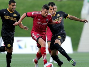 Ottawa's Carl Haworth gets ahead of Fort Lauderdale's Luis Felipe Fernandes during FC's matchup against Strikers on May 27. (Julie Oliver, Postmedia Network)