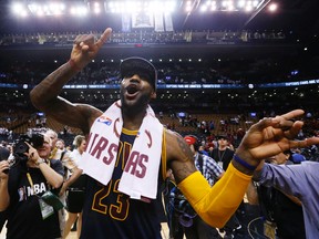Cleveland Cavaliers forward LeBron James (23) celebrates after beating the Toronto Raptors in Game 6 of the Eastern Conference final in Toronto Friday February 26, 2016. (Stan Behal/Toronto Sun/Postmedia Network)