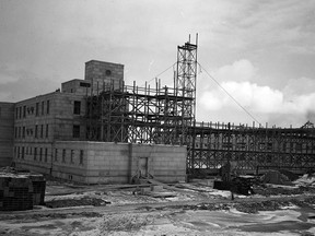 The former St. Thomas Psychiatric Hospital under construction in January, 1938. Author Terry Boyle is seeking ghost stories about reported hauntings at the now-closed institution, and at other locations in St. Thomas and London, and area.