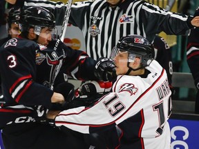 Rouyn-Noranda Huskies' Antoine Waked, right, collides with Red Deer Rebels' Colton Bobyk during first period CHL Memorial Cup semi-final hockey action in Red Deer, Friday, May 27, 2016.THE CANADIAN PRESS/Jeff McIntosh