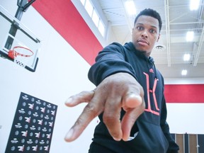 Kyle Lowry has a little fun at the Biosteel Centre yesterday. (Veronica Henri/Toronto Sun)