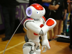 The NAO, the Watson Powered IBM Robot, dances at the 14th Annual IEEE Ottawa Robotics Competition at Longfields-Davidson Heights Secondary School in Ottawa on Saturday, May 28, 2016.