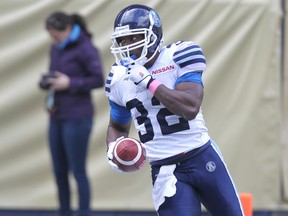 Toronto Argonauts slotback Andre Durie scores a touchdown during action against the Winnipeg Blue Bombers at Investors Group Field in Winnipeg Oct. 19, 2013. (Postmedia Network file photo)