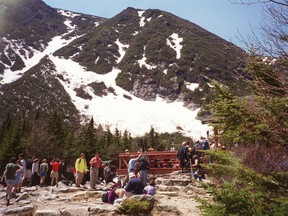 Hikers stop for a moment while hiking up Mount Washington in New Hampshire. (Postmedia Network file photo)