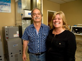 Eric and Cindy Barron are partners in life, as well as business.  They run a successful company that has grown from humble beginnings to a well-known enterprise with fiercely loyal customers. People care more about air-conditioning in the summer than heating in the winter, they say. (Mike Hensen/The London Free Press)