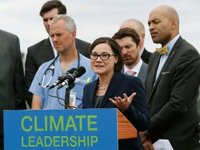 Shannon Phillips (Alberta Minister Responsible for the Climate Change Office) on the roof of the Federal Building in Edmonton on May 24, 2016. Postmedia Network File Photo