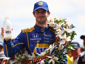 Alexander Rossi, driver of the #98 NAPA Auto Parts Andretti Herta Autosport Honda celebrates after winning the 100th running of the Indianapolis 500 at Indianapolis Motorspeedway on May 29, 2016. (Chris Graythen/Getty Images/AFP)
