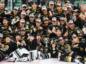 The London Knights celebrate their overtime victory in CHL Memorial Cup championship game hockey action against the Rouyn-Noranda Huskies in Red Deer, Sunday, May 29, 2016.THE CANADIAN PRESS/Jeff McIntosh