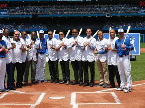 Former and current Jays take part in a pre-game ceremony as the Blue Jays lost 5-3 to the Boston Red Sox in 11 innings at the Rogers Centre in Toronto on May 29, 2016. (Michael Peake/Toronto Sun/Postmedia Network)