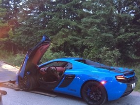 A McLaren Spider is impounded by Halton Regional Police after being busted going more than twice the speed limit in Burlington May 29, 2016. (Halton cops photo)