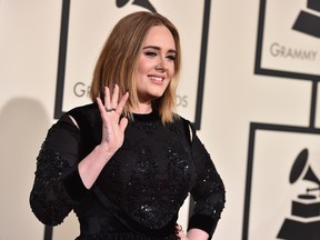 Adele arrives at the 58th annual Grammy Awards at the Staples Center on Monday, Feb. 15, 2016, in Los Angeles. (Photo by Jordan Strauss/Invision/AP)