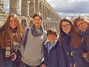 County Central High School student BreAnn Wyatt, second from left, who went to Spain for 10 weeks through the Alberta Education’s International Education Exchange Program, is pictured here with her host family.  This photo was photo taken at the aqueduct at Segovia, Spain. Submitted photo