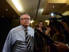 Public Safety and Emergency Preparedness Minister Ralph Goodale arrives to appear as a witness at a National Security and Defence Senate committee in Ottawa on Monday, May 30, 2016. THE CANADIAN PRESS/Sean Kilpatrick