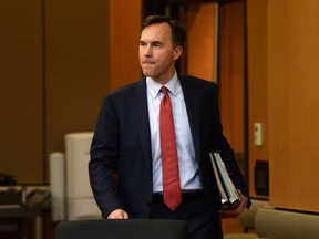 Minister of Finance Bill Morneau appears as a witness at a standing committee on finance in Ottawa on Monday, May 30, 2016. THE CANADIAN PRESS/Sean Kilpatrick